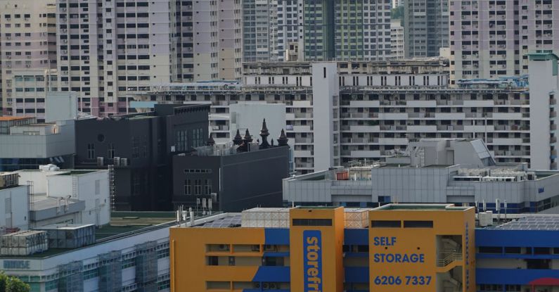 Mezzanine Storage - A city skyline with many buildings and a large building