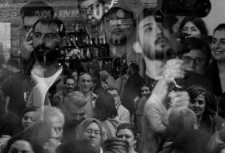 Double-Glazing Windows - A black and white photo of people in a crowd