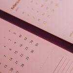 Color Of The Year - Calendar with inscriptions and numbers on office table